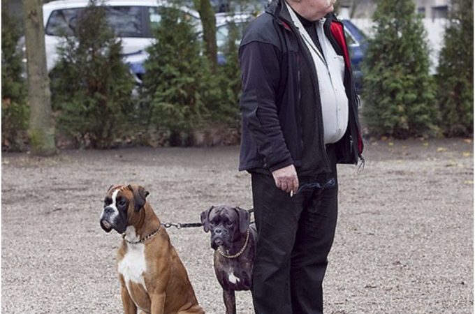 Old guy looks like his dog