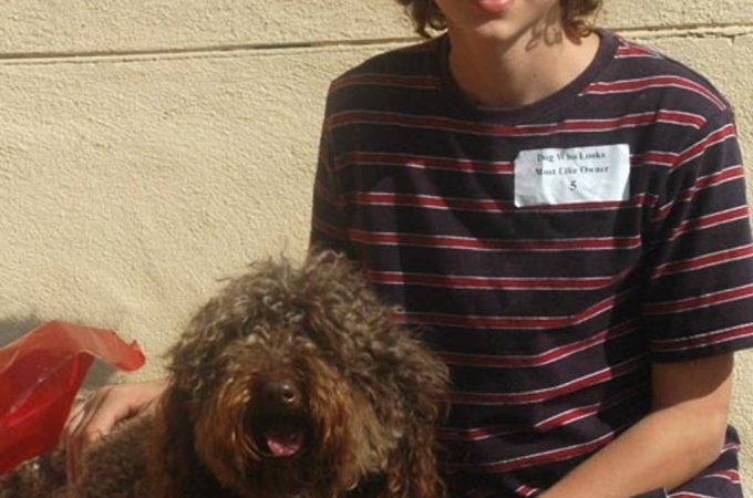 Curly haired guy with his dog